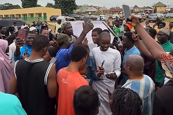 VeryDarkMan Pulls A Large Crowd After Turning Up At A Ghetto In Abuja In Tesla Cybertruck - autojosh