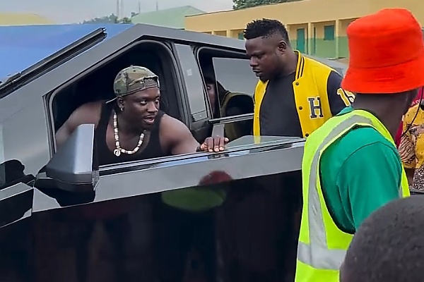 VeryDarkMan Pulls A Large Crowd After Turning Up At A Ghetto In Abuja In Tesla Cybertruck - autojosh