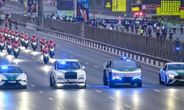 Dubai Police Rolls-Royce Cullinan And Tesla Cybertruck Escorts Cyclists During Dubai Ride 2025 - autojosh