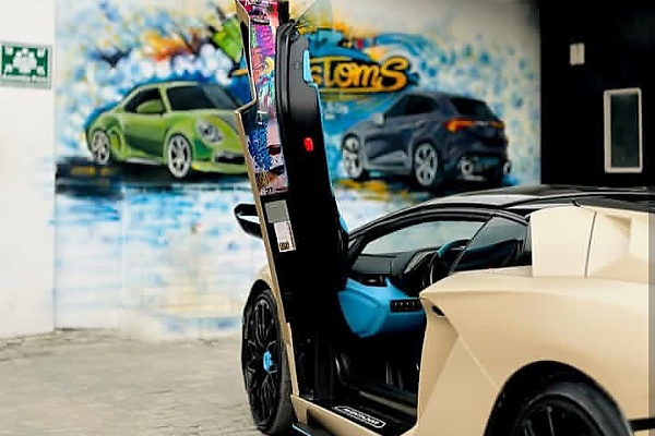 Davido’s Lamborghini Aventador Gets New Wrap With Customized “001” Decal, “Omo Baba Olowo” Painting - autojosh