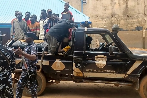 Abuja: FRSC Busted Overloaded Truck Hiding 15 Passengers And 8 Motorcycles Under Tarpaulin - autojosh 