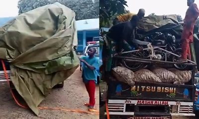 Abuja: FRSC Busted Overloaded Truck Hiding 15 Passengers And 8 Motorcycles Under Tarpaulin - autojosh