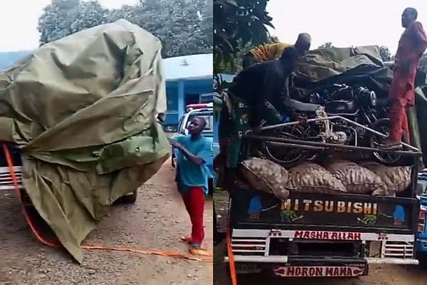 Abuja: FRSC Busted Overloaded Truck Hiding 15 Passengers And 8 Motorcycles Under Tarpaulin - autojosh
