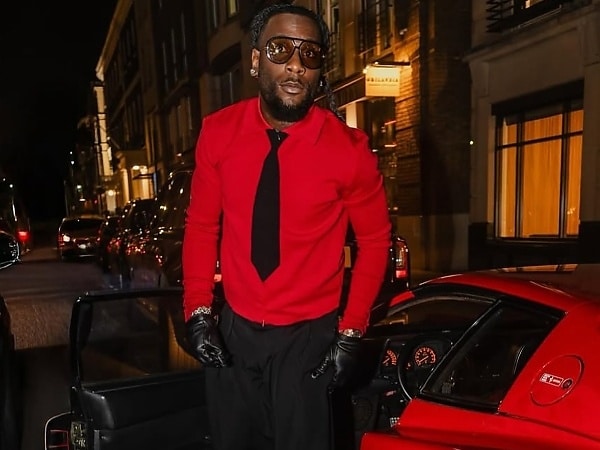 Burna Boy Lifts ₦1.6B Ferrari Testarossa Into His 26th Floor Penthouse - autojosh