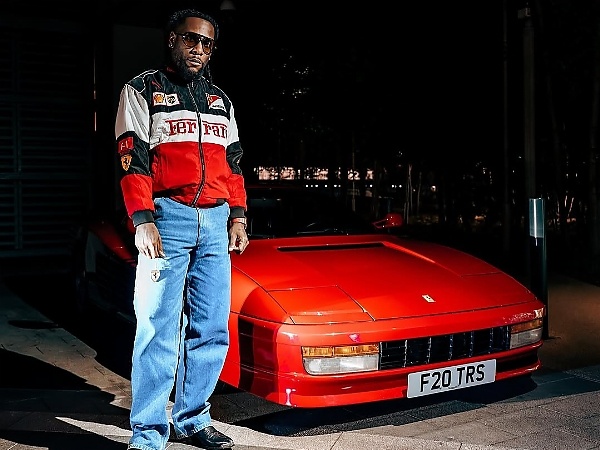 Burna Boy Lifts ₦1.6B Ferrari Testarossa Into His 26th Floor Penthouse - autojosh