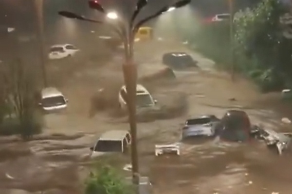 Ultimate Move: Quick-Thinking Chinese Motorist Hoists ₦760M Bentley With Crane To Escape Flooding - autojosh 