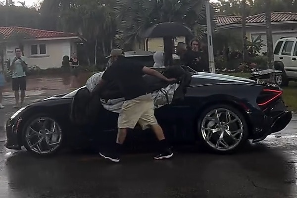 $5M Car With No Roof? Handlers Rush To Save Bugatti W16 Mistral Interior During Heavy Rain - autojosh