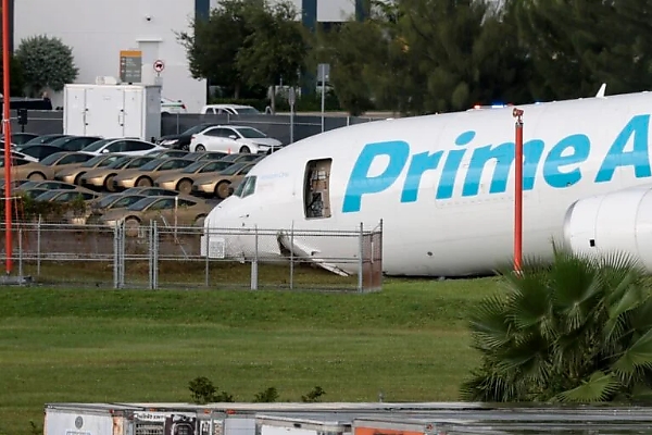 Amazon Cargo Plane Crashes In Miami, Narrowly Misses Car Lot Full Of Tesla Cybercabs - autojosh 