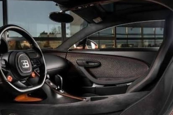 Inside Andrew Tate’s Bugatti Chiron With Custom “Tate” Headrests, Which He Claimed Was Rented