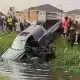 Man Flees With Stolen Tundra During Test-Drive, Crashes Into Lagos Canal After Damaging Dozens Of Vehicles