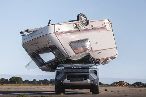 Toyota Drops 760kg Caravan on All-Electric Hilux To Prove It Remains ‘Indestructible’